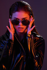 portrait of young woman in sunglasses