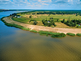Beautiful panoramic aerial drone view to the place of connecting the Bug and Narew rivers with a...