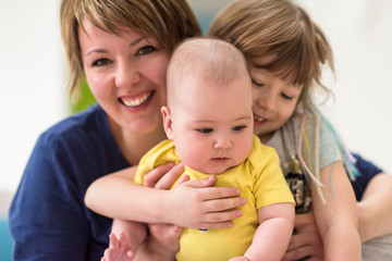 portrait of young mother with  her kids