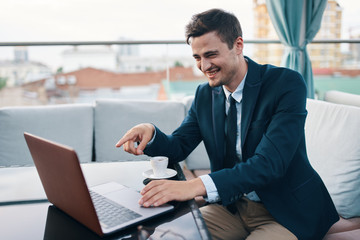 Fototapeta premium businessman working on laptop in office