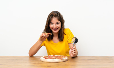 Caucasian girl with a pizza