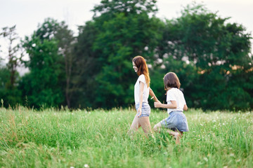 Fototapeta premium mother and daughter in the park