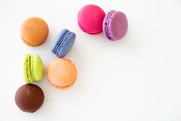 Selbstklebende Fototapeten Macarons Colorful macarons on white background, close up view  © Rawf8