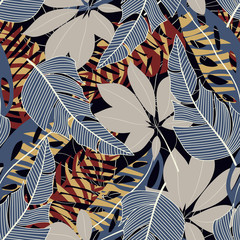 Original abstract seamless pattern with colorful tropical leaves and plants on black background. Vector design. Jungle print. Flowers background. Printing and textiles. Exotic tropics. Fresh design.