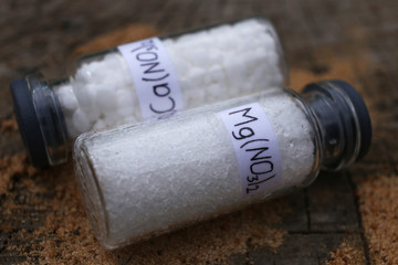Hygroscopic magnesium nitrate salt crystals in a glass jar.