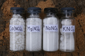 Combustible crystalline substances, salts nitrates: calcium, magnesium, sodium, potassium, in glass...