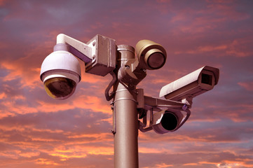 closed circuit camera Multi-angle CCTV system. against a red sky