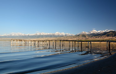 Wooden pier on Issyk-Kul lake. Kyrgyzstan