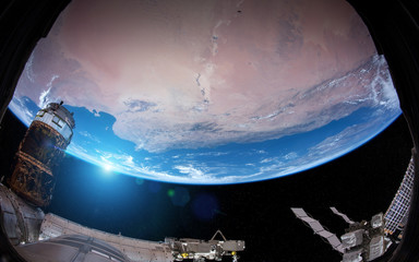 Obraz na płótnie Canvas View of planet Earth from a space station window during a sunrise 3D rendering elements of this image furnished by NASA