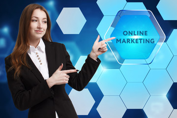 The concept of business, technology, the Internet and the network. A young entrepreneur working on a virtual screen of the future and sees the inscription: Online marketing