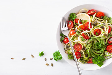 vegan ketogenic spiralized courgette salad with avocado tomato pumpkin seeds