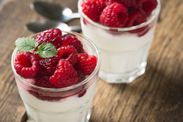 Natural yogurt with fresh raspberries