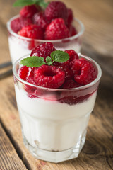 Natural yogurt with fresh raspberries