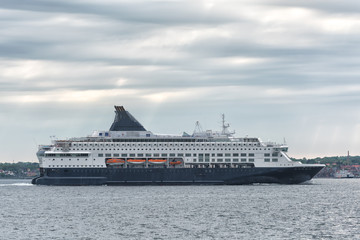 Big cruise ship in the sea at sunset. Beautiful seascape