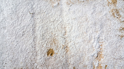Natural white salt crystal texture on the sand