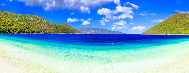 Best beaches of Kefalonia - Antisamos with turquoise waters and green mountains. Greece, Ionian islands