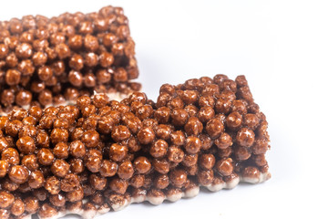Close up of Chocolate Breakfast Cereal Bar Isolated on white background. Shallow depth of field