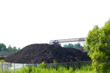 Coal on a white background sky