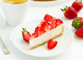 Classic cheesecake with fresh strawberries. Selective focus.