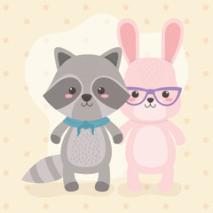 cute and little raccoon and rabbit characters