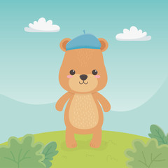 Obraz na płótnie Canvas cute and little bear teddy in the field