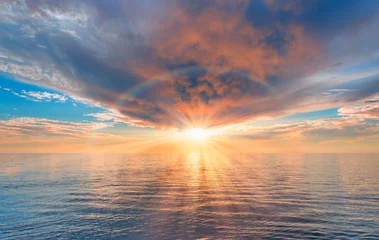 Selbstklebende Fototapeten Storm on the calm sea with amazing sunset © muratart