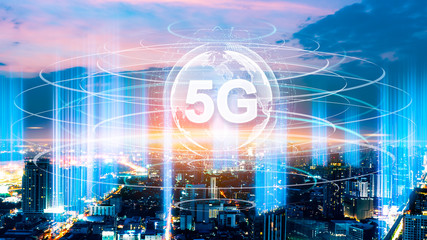 5G network digital hologram and internet of things on city background.5G network wireless systems.IoT(Internet of Things), ICT(Information Communication Technology),communication network concept.