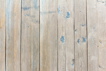 wooden background,old wooden fence with remnants of blue paint