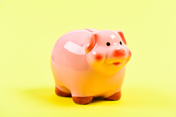Money is a power. financial problem. money saving. piggy bank on yellow background. income management. planning budget. Piggy bank with coin. saving or accumulation of money, investment