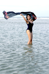 pretty asian women sexy on beach on vacationday