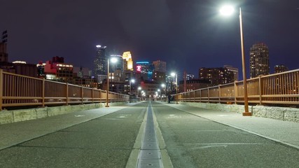 Time lapse of the Minneapolis Minnesota skyline seen from one of the many bridges crossing the Mississippi River.