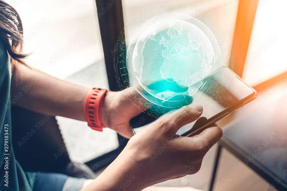 Poster close up of female hand with smartphone and world map virtual digital globe hologram. concept of glo