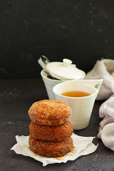 Donuts with cinnamon and chocolate cream. Homemade baking. Selective focus.