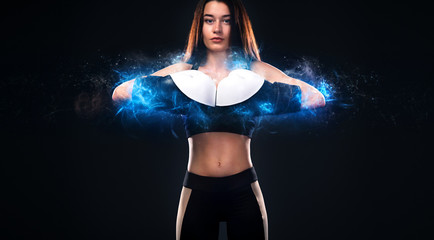 Sportsman, woman boxer fighting in gloves on black background. Boxing and fitness concept.