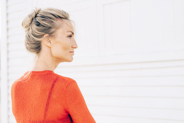 Profile portrait of a gorgeous blond woman with a beautiful face, straight nose and thick...