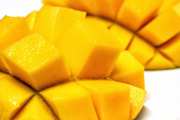 fresh juicy yellow Thai chopped mango on the table 