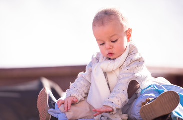 Fototapeta premium portrait of little baby boy on beautiful winter day