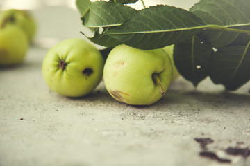 green apple on ground