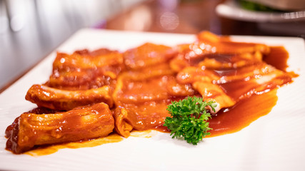 Plate of raw pork ribs for grilling