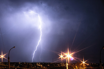 lightnings and thunder bolt strike at summer storm