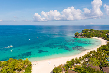 Beautiful Punta Bunga Beach on Boracay island, Philippines.Hotels near the beach in sunny weather. The coast of the island of Boracay for tourists.