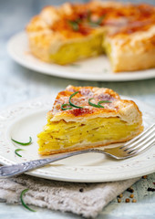 Piece of French puff pastry with potatoes.