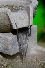 Water flowing over ledge