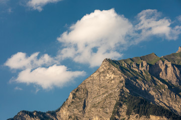 beautiful day in the mountains. beautiful summer weather. mountain on a background of clouds
