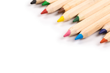 Wooden colorful ordinary pencils isolated on a white background