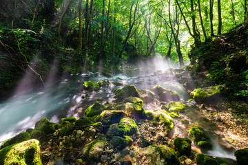 Morning sun flare light at Bigar Waterfall,Caras-Severin,Romania