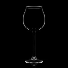 Empty wine glass isolated on black