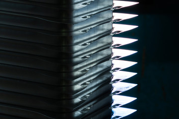 Steel sheets deposited in stacks in packs at the warehouse of metal products. Weathered metals...