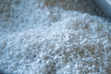 raw plastic material white granules in metal box