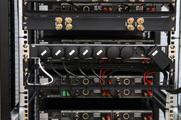 Low-current rack of electronic equipment for the Internet and multiroom. Connecting wires using connectors and jacks.